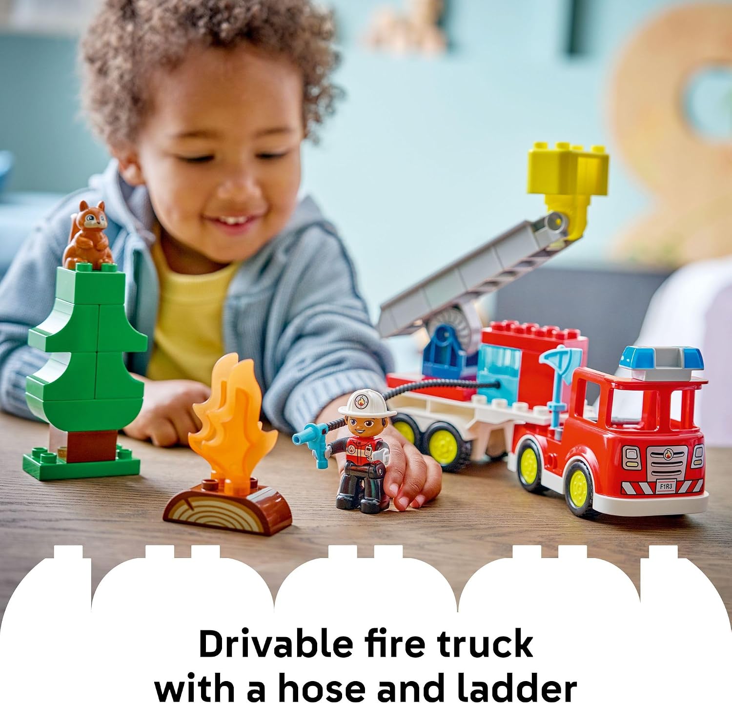 FIRE TRUCK WITH HOSE AND FIREFIGHTER